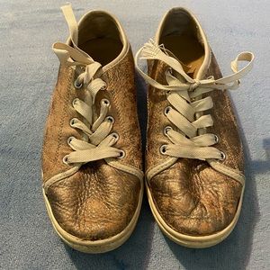 Distressed gold leather Fossil sneakers